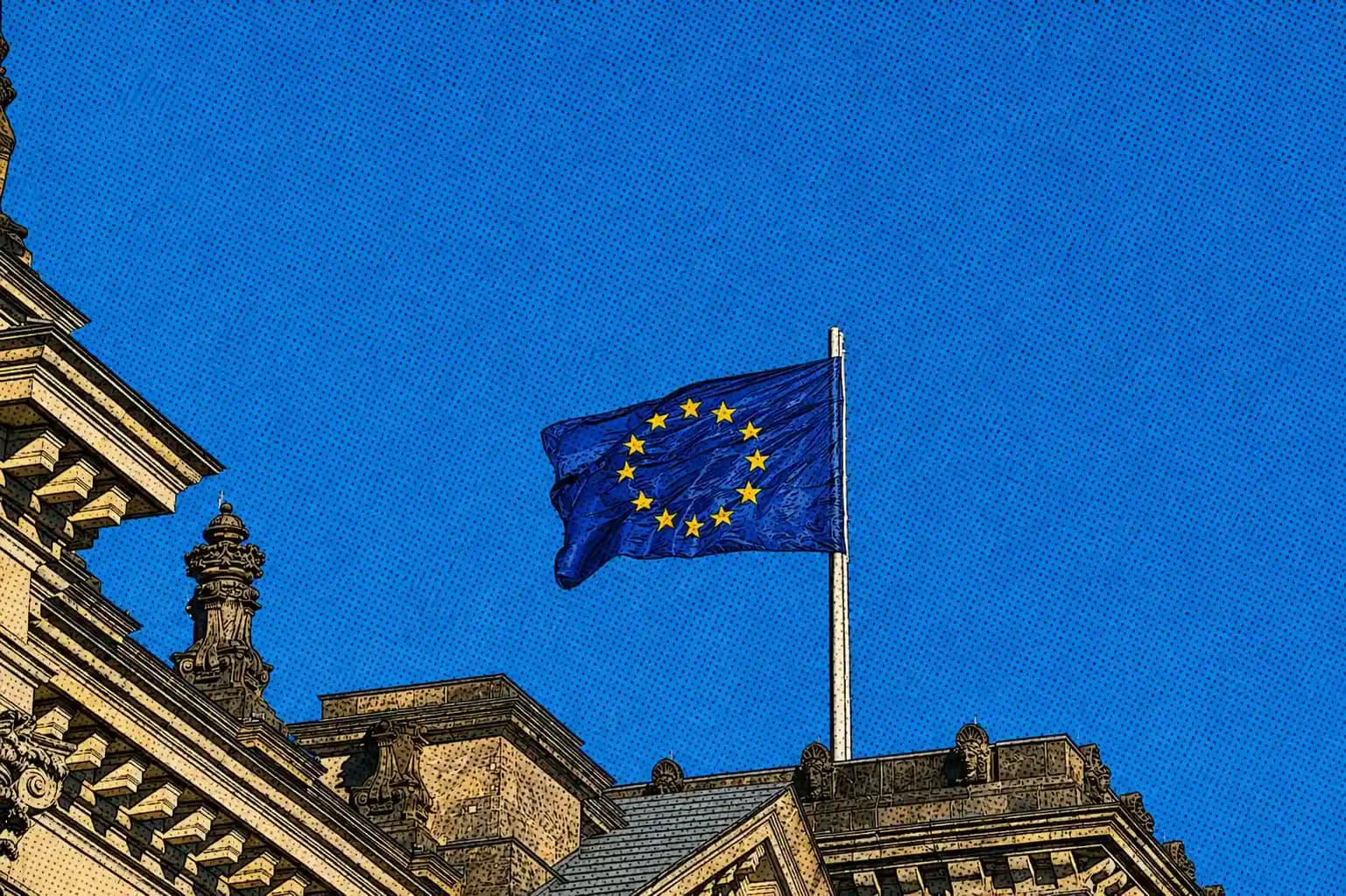 European Union flag flying above a historic European building